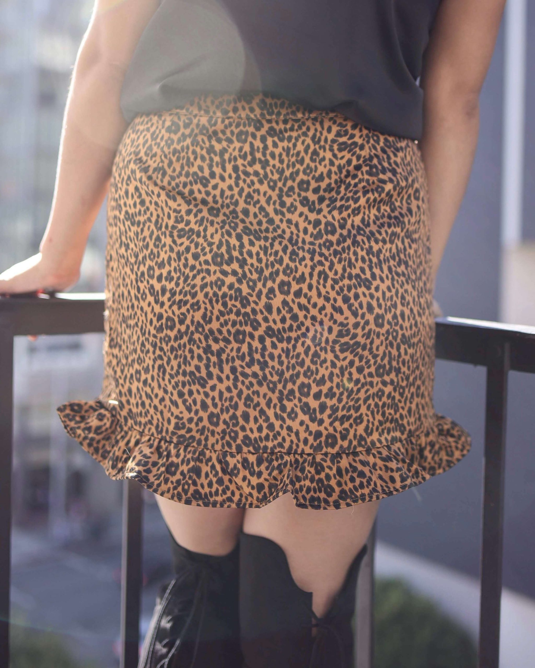 Satin_Tan_Ruffle_Hem_Faux_Front_Wrap_Mini_Skirt_in_Leopard_Print_6_6ae154f4-4def-4ff5-adf5-eac22831b0c8-scaled-1.jpg
